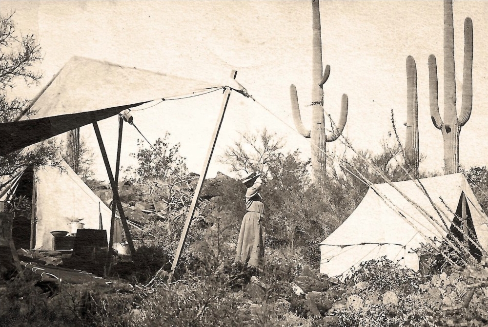 Mary Lloyd tends to her kitchen in Tumamocville. Photo from the records of the Lloyd Family.